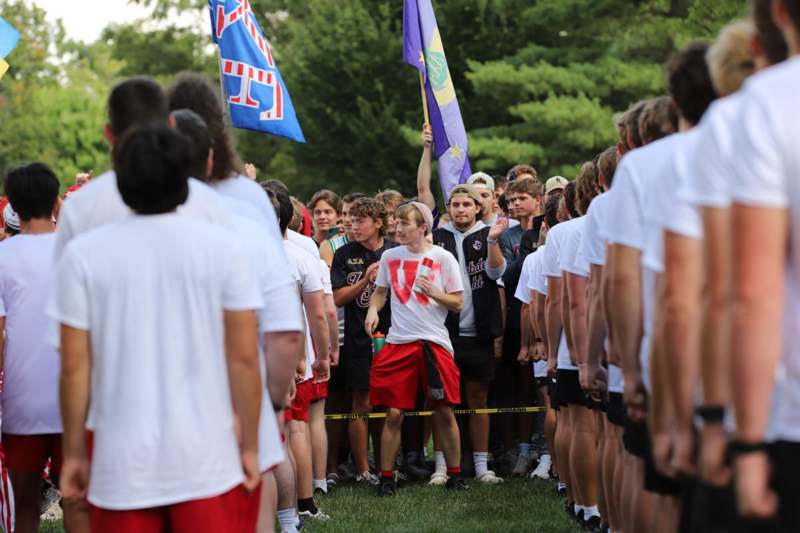 a group of people standing in a line