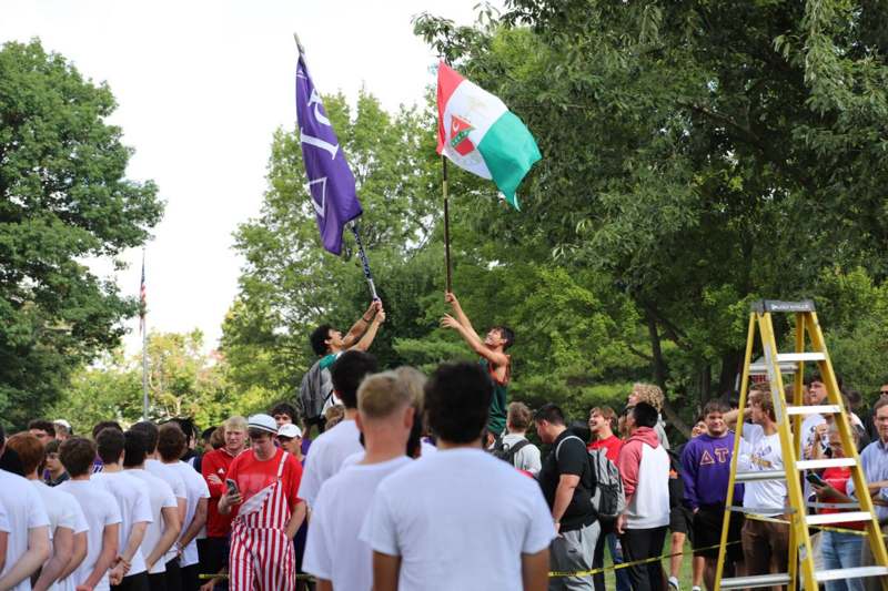 a group of people standing in a crowd