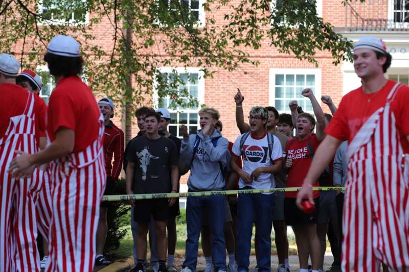 a group of people standing in a line