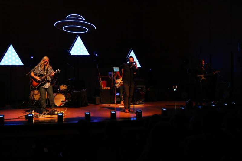 a group of people on a stage
