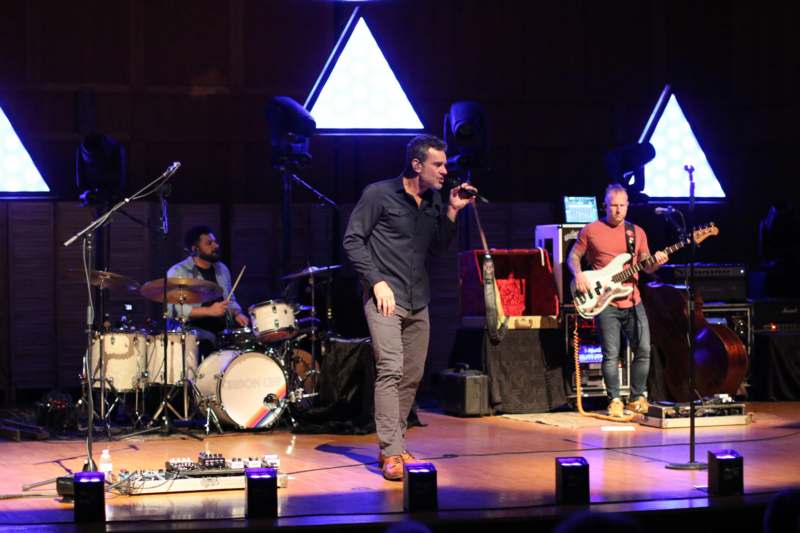 a group of men on a stage