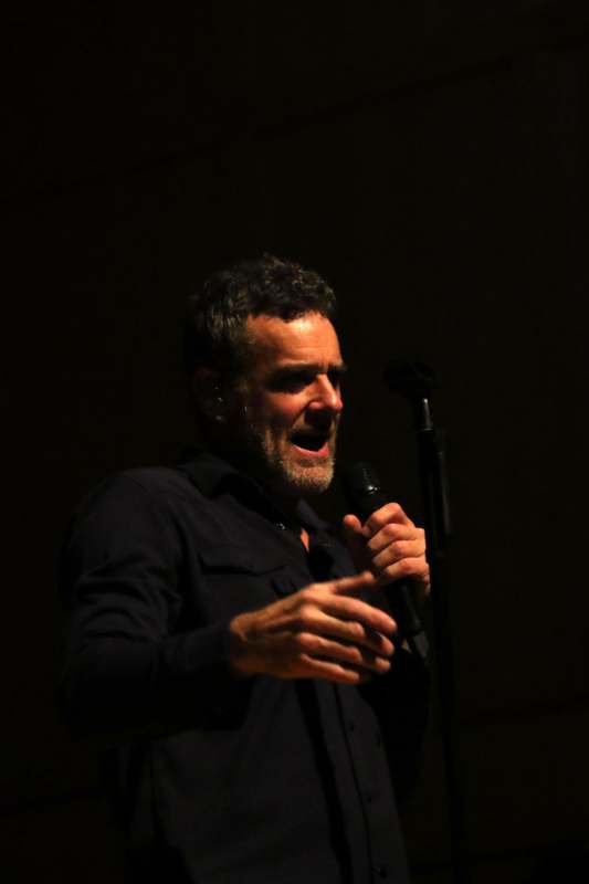 a man holding a microphone
