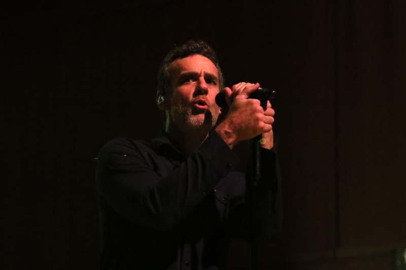 a man holding a microphone