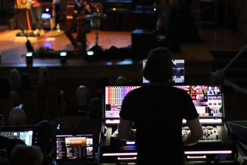 a man working on a music mixer