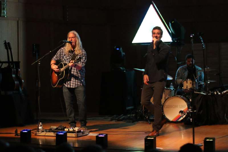 a group of men on a stage