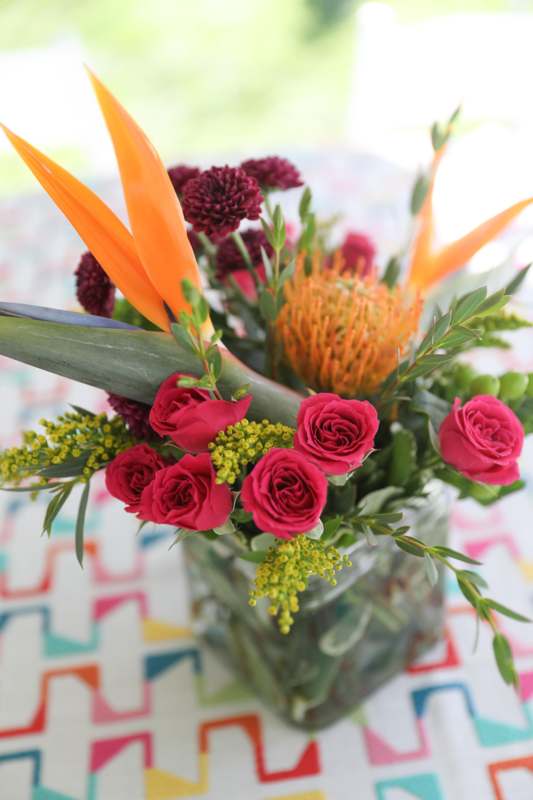 a bouquet of flowers in a glass vase