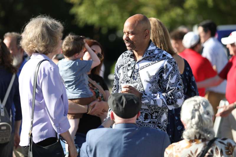a man standing in a crowd