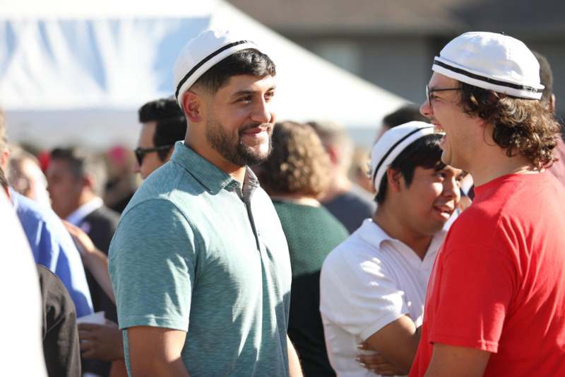 a group of men laughing