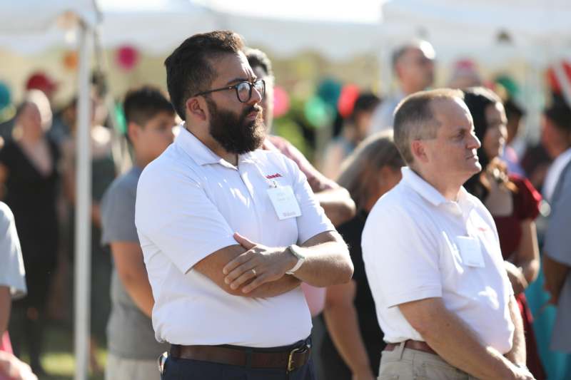 a group of men standing outside