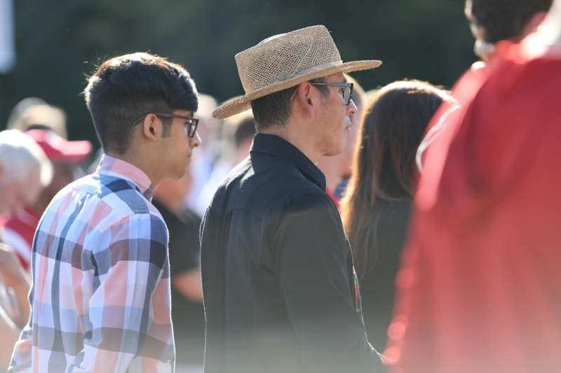 a group of people standing outside