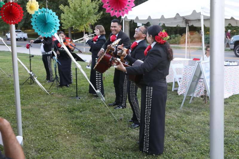 a group of people playing instruments