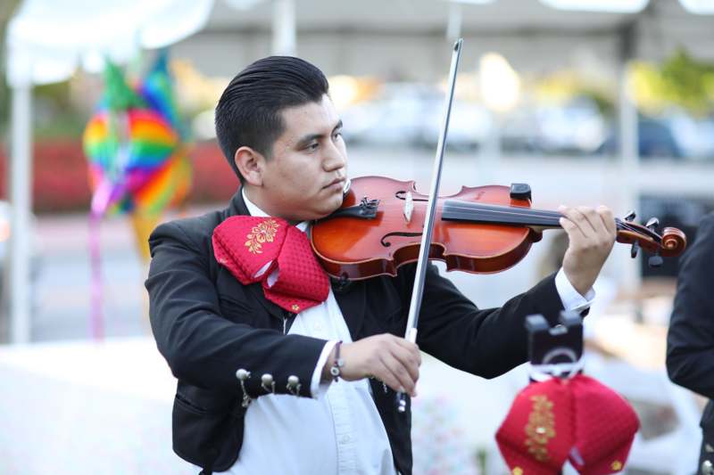 a man playing a violin