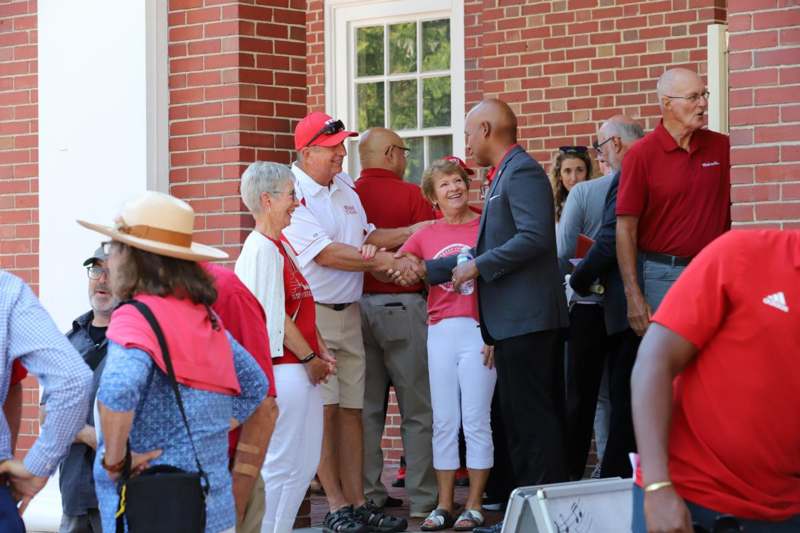a group of people shaking hands