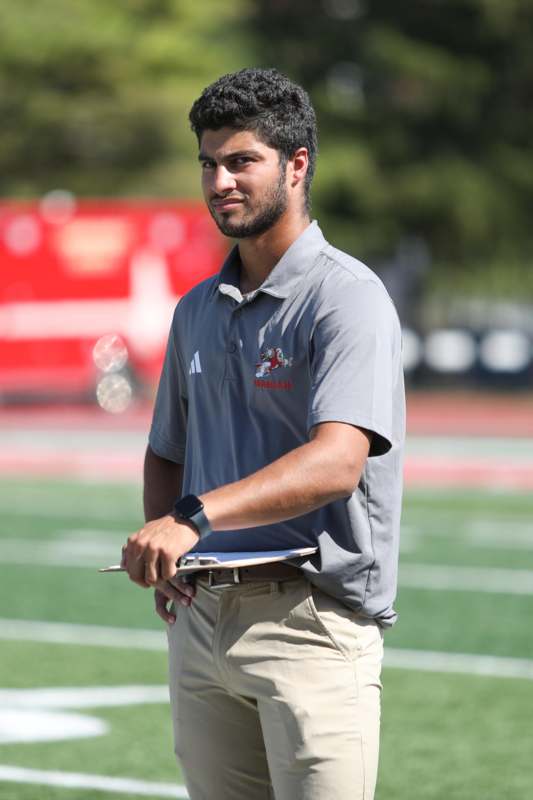 a man standing on a football field