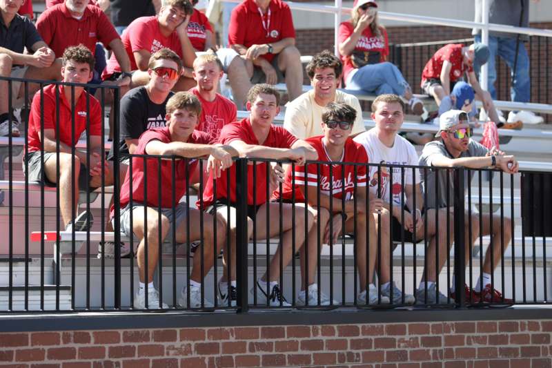 a group of people sitting on stairs