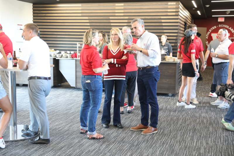 a group of people standing in a room