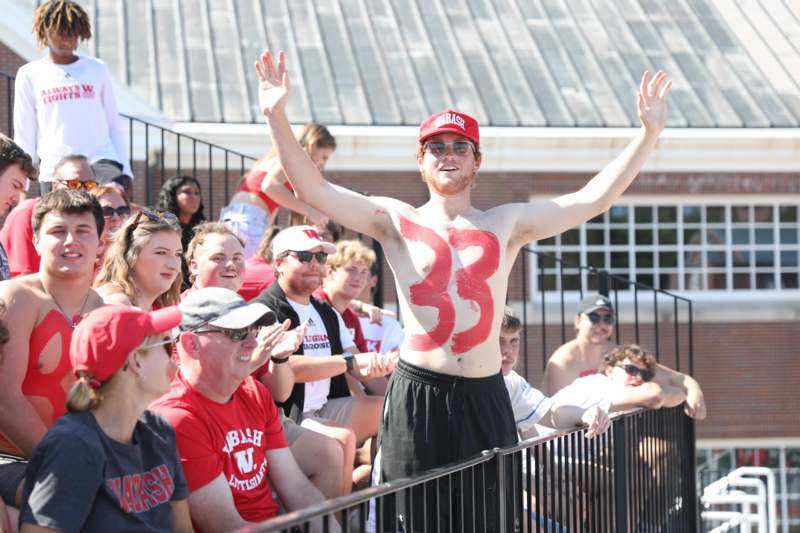 a man with a number painted on his body
