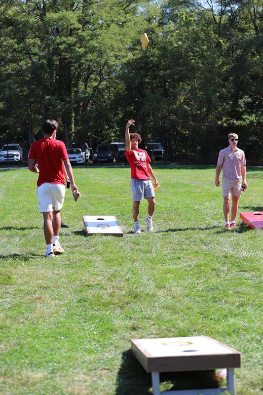 a group of people playing in a park