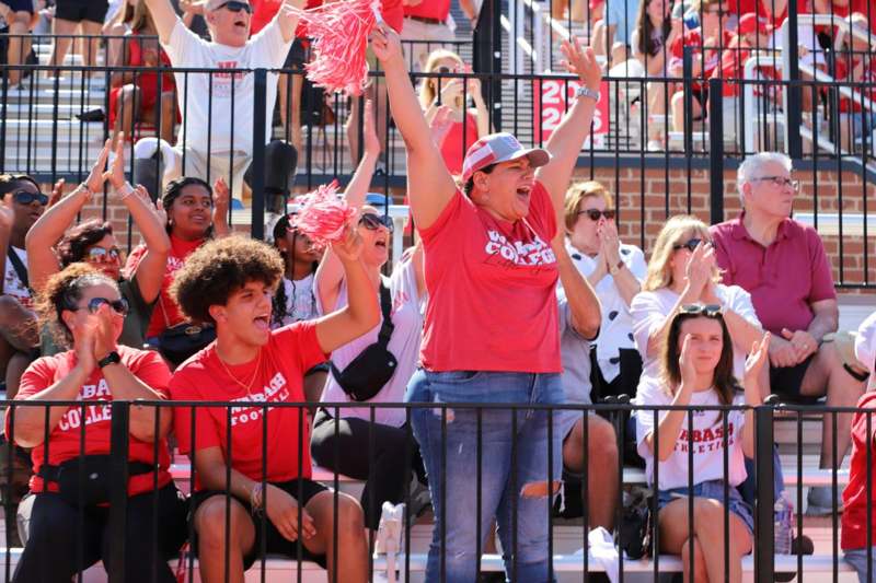 a group of people in bleachers