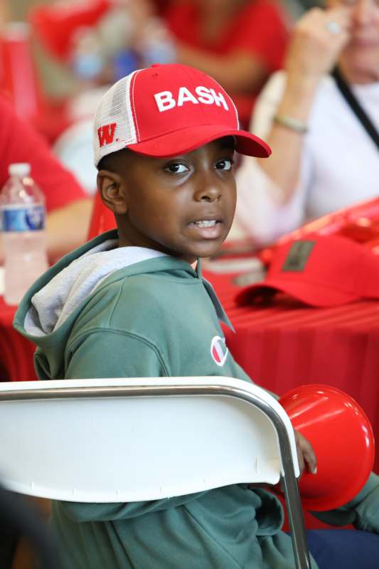 a boy wearing a hat