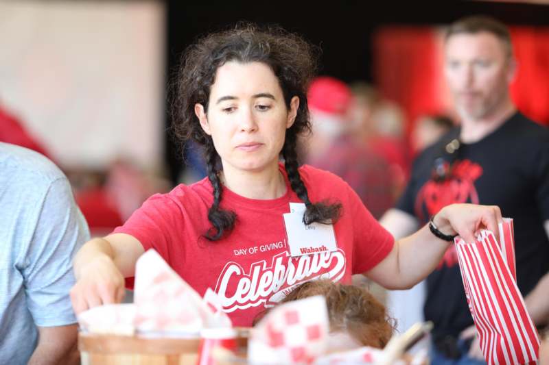 a woman in a red shirt