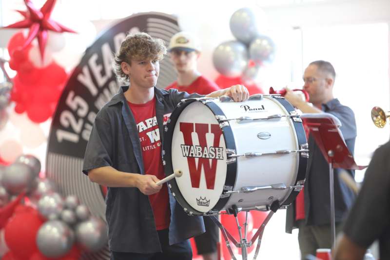 a man playing a drum