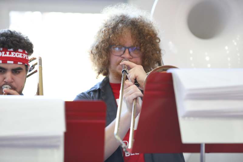 a man playing a trombone