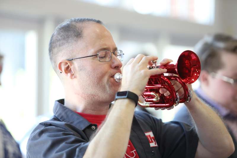 a man playing a trumpet