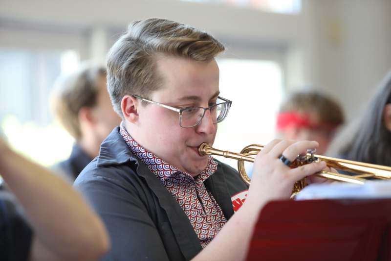 a man playing a trumpet