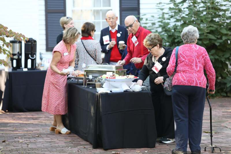 a group of people at a buffet