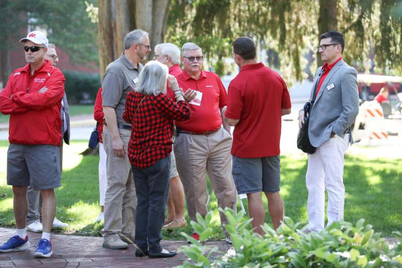 a group of people standing outside