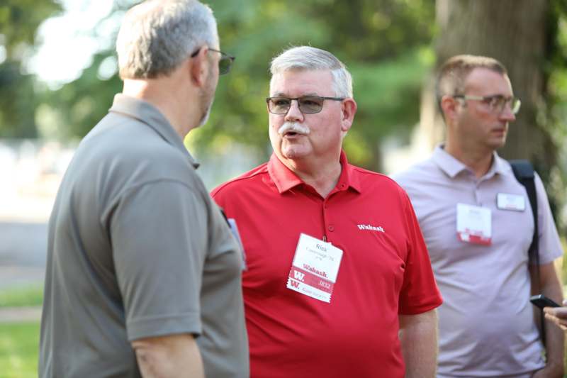 a group of men talking