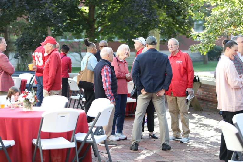 a group of people standing outside