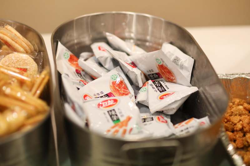 a silver container with food in it