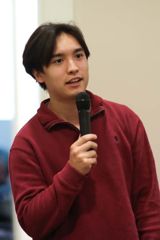 2025 Mid-Autumn Festival - a man holding a microphone