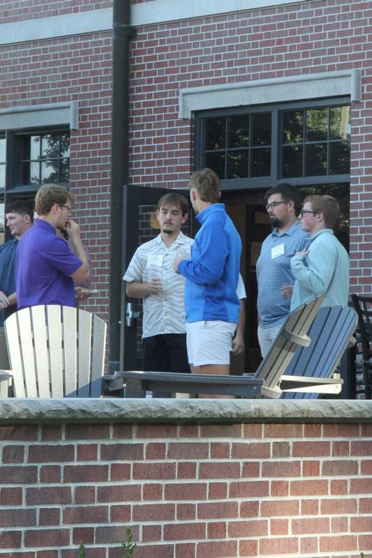 a group of people standing outside a building