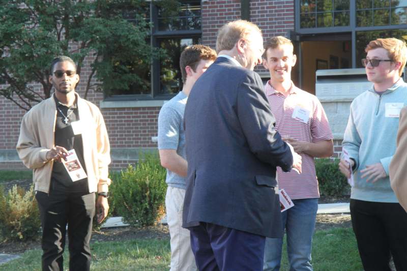 a group of people standing outside