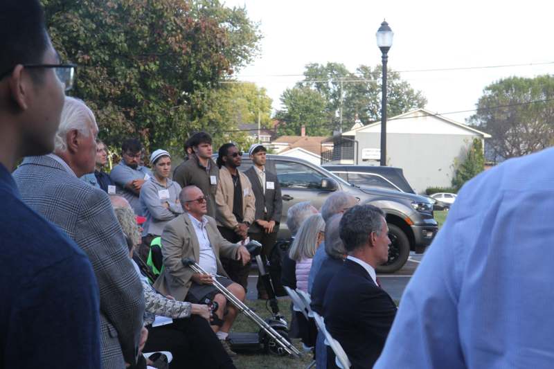 a group of people sitting in chairs