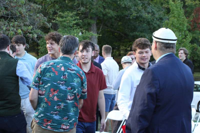 a group of people standing in a line