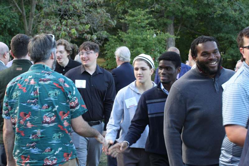a group of people standing outside