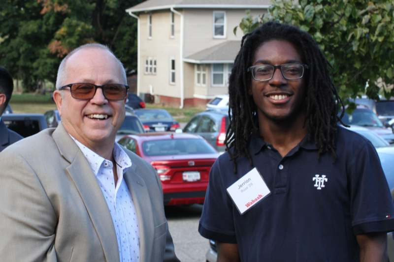 a man and a man smiling