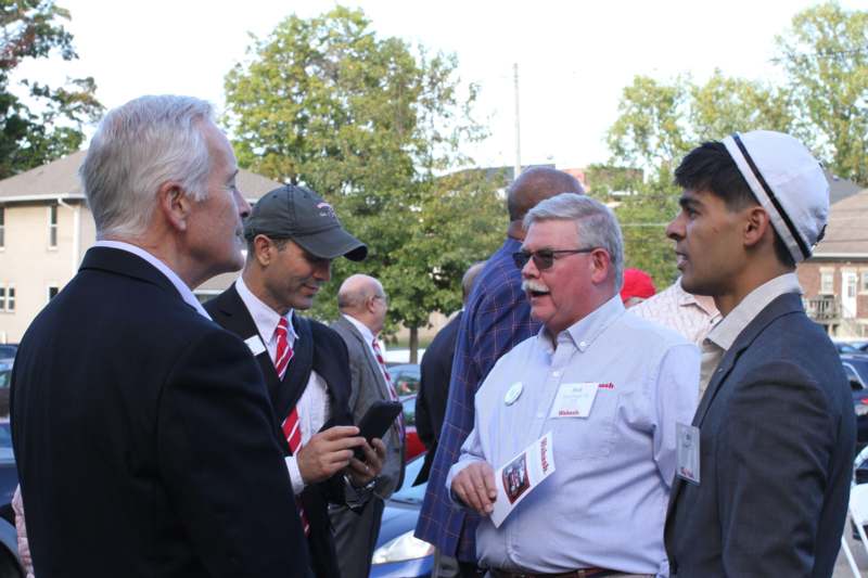 a group of men talking