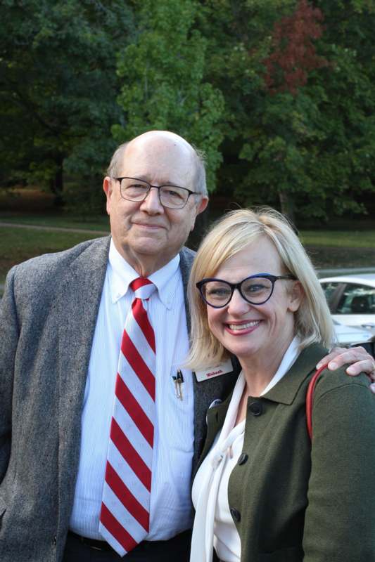 a man and woman posing for a picture