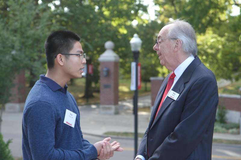 a man talking to a man