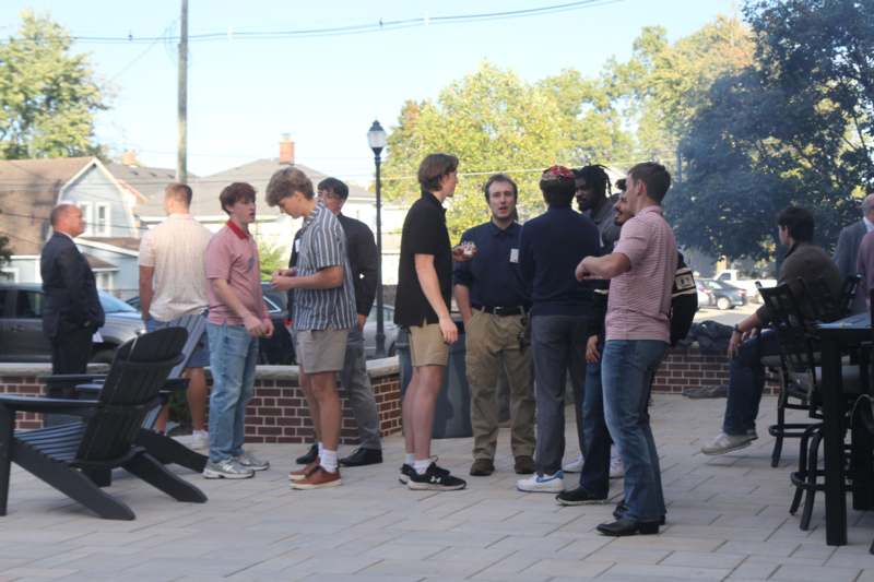 a group of people standing outside