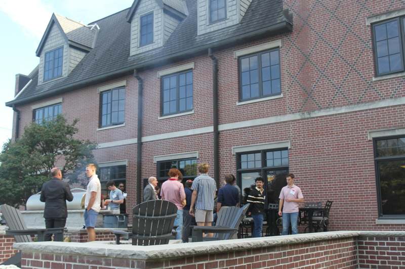 a group of people outside a building