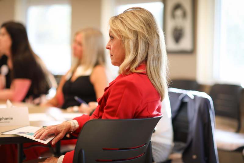 a woman sitting in a chair
