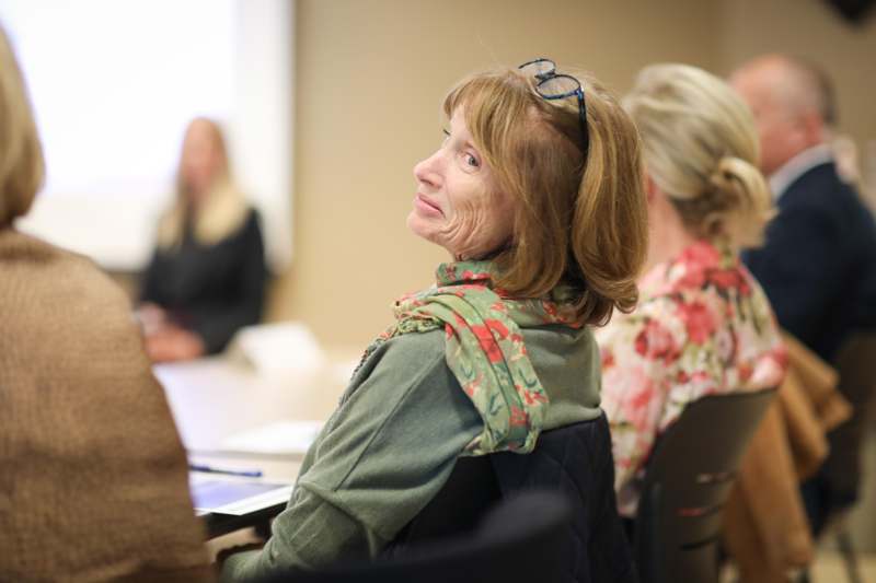 a woman sitting in a room