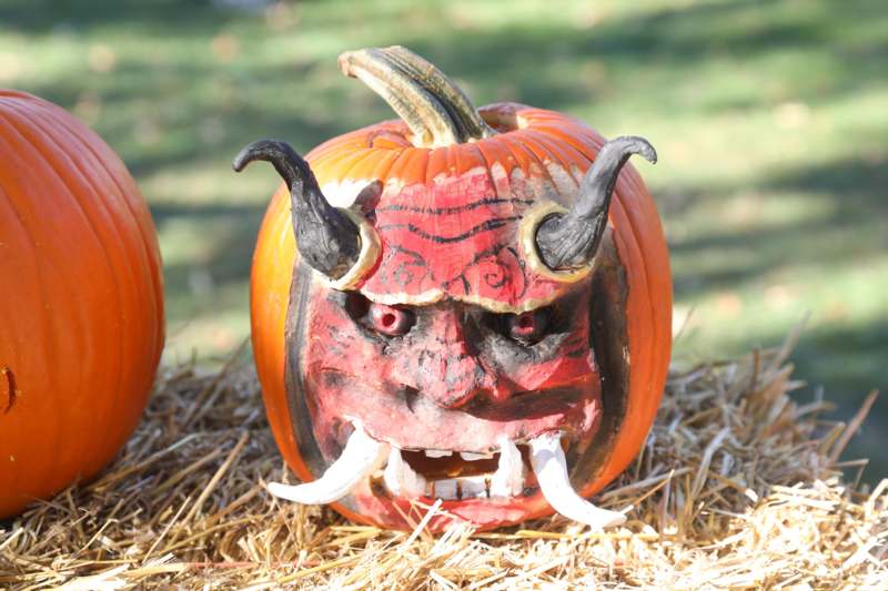 a pumpkin with a face carved into it