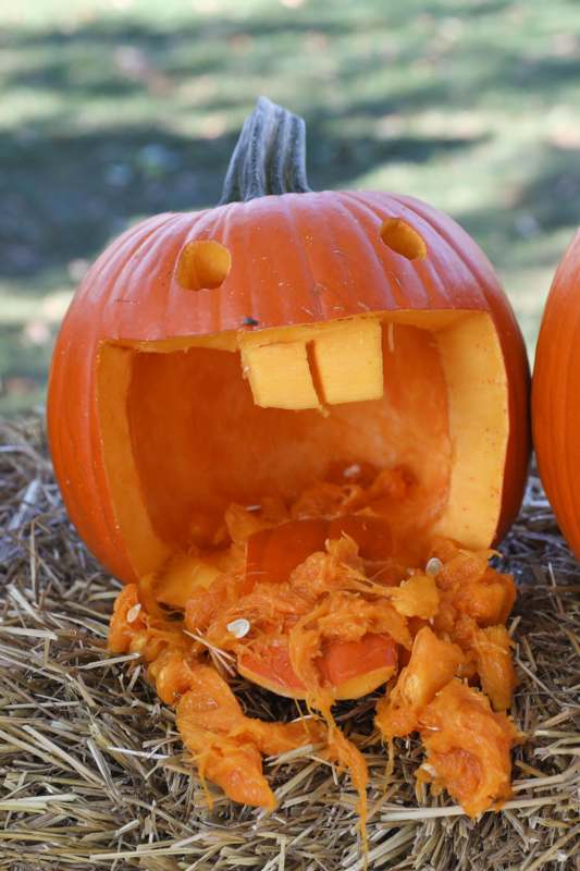 a pumpkin with a face cut out
